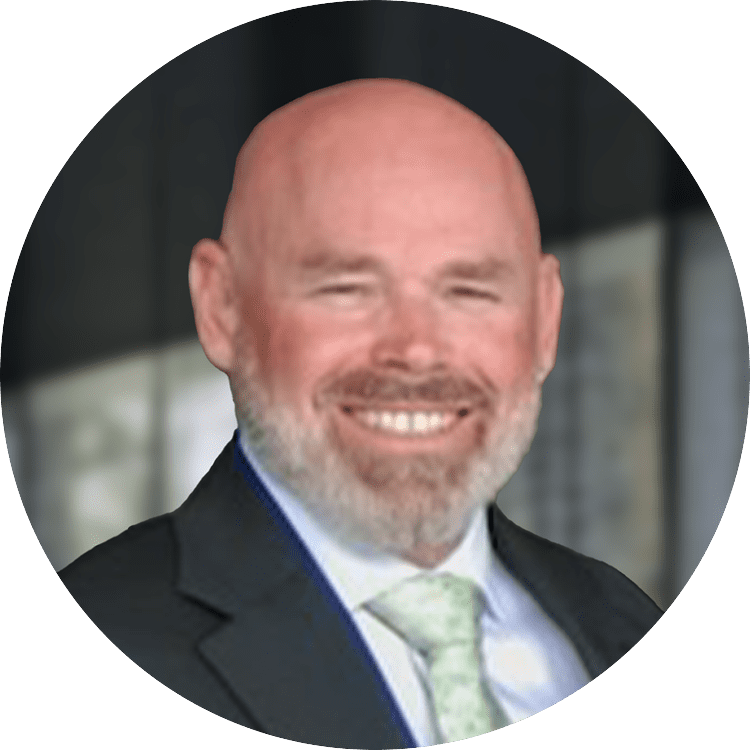 Bald man with a beard smiling
